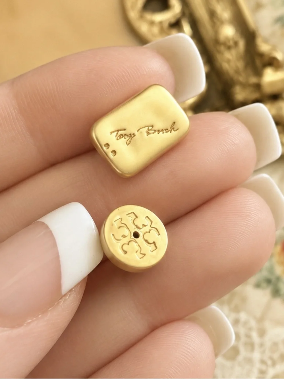 TORY BURCH • Gold Torsade Signature Luggage Tag Nugget Logo Plaque Earrings